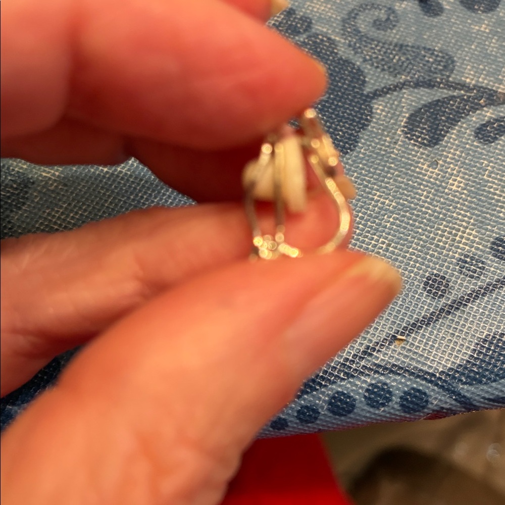 Claire’s Clip on Silver Star Earrings with White Cushion Backs - Picture 3 of 5
